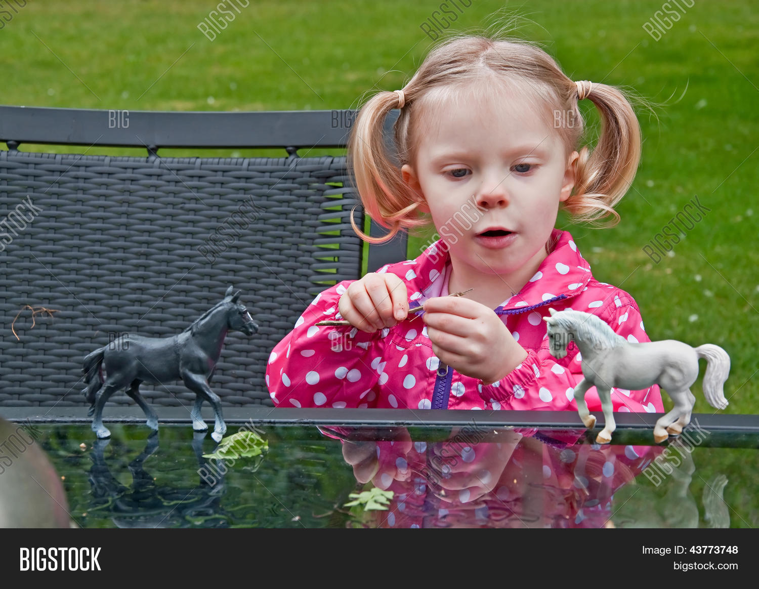 Little Girl Playing With Toy Horses Stock Photo & Stock Images Bigstock