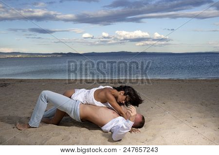 Sex On Beach Concept Couple In Love Have Sex Makes Love On Sand Beach Sex On Beach Concept Couple In Love Have Sex Makes Love On Sand Beach