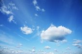 stock photo of blue sky  - Beautiful white clouds over blue sky - JPG 