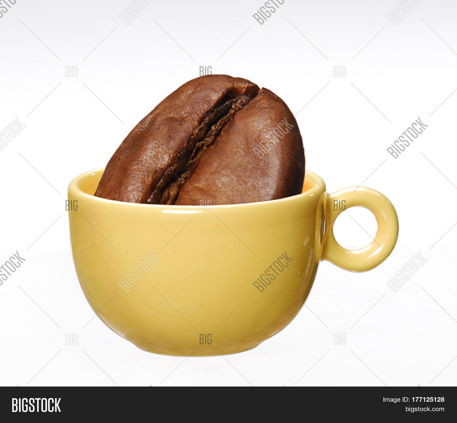 big coffee big coffee bean on yellow cup image photo bigstock big coffee big coffee bean on yellow cup image photo bigstock