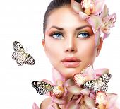 picture of nature  - Beautiful Girl With Orchid Flowers and Butterfly - JPG 