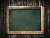 picture of restaurant  - Aged green blackboard hanging on wooden wall as a background for your message - JPG 