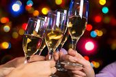 foto of holidays  - Image of people hands with crystal glasses full of champagne - JPG 