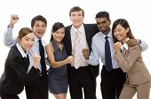 picture of business people  - a diverse business team celebrates a success - JPG 