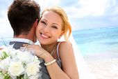 picture of holidays  - Bride embracing her groom - JPG 