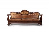 image of opulence  - A beautiful antique wooden couch is isolated on a white background - JPG 