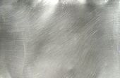 stock photo of tough  - Brushed Metal texture with lighting and lens ghost - JPG 