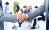 stock photo of handshake  - Business handshake and business people - JPG 