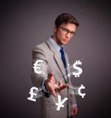image of currency  - Attractive young man throwing currency icons - JPG 