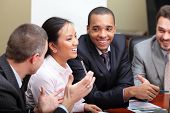 picture of meeting  - Multi ethnic business team at a meeting - JPG 