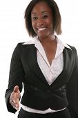 stock photo of handshake  - A pretty business woman offering a handshake - JPG 