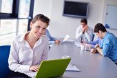 image of meeting  - Group of happy young  business people in a meeting at office - JPG 