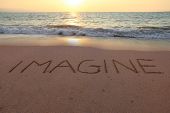 picture of beach  - Imagine written in the sand on a sunset beach - JPG 