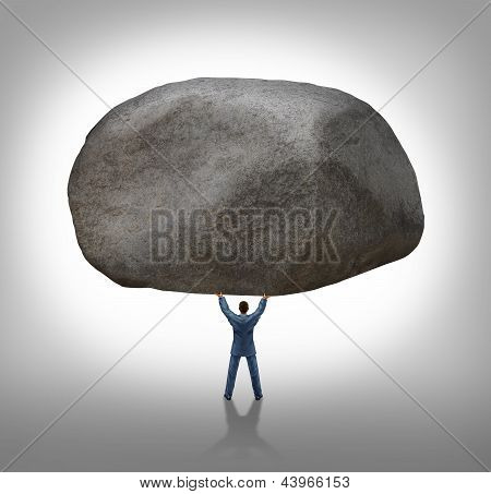 Picture or Photo of Power of leadership with the ability to inspire as a businessman lifting up a huge boulder removing a large obstacle and leading by example as a business concept of success and determination.