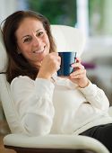 picture of indoors  - Happy Mature Woman Drinking Coffee - JPG 