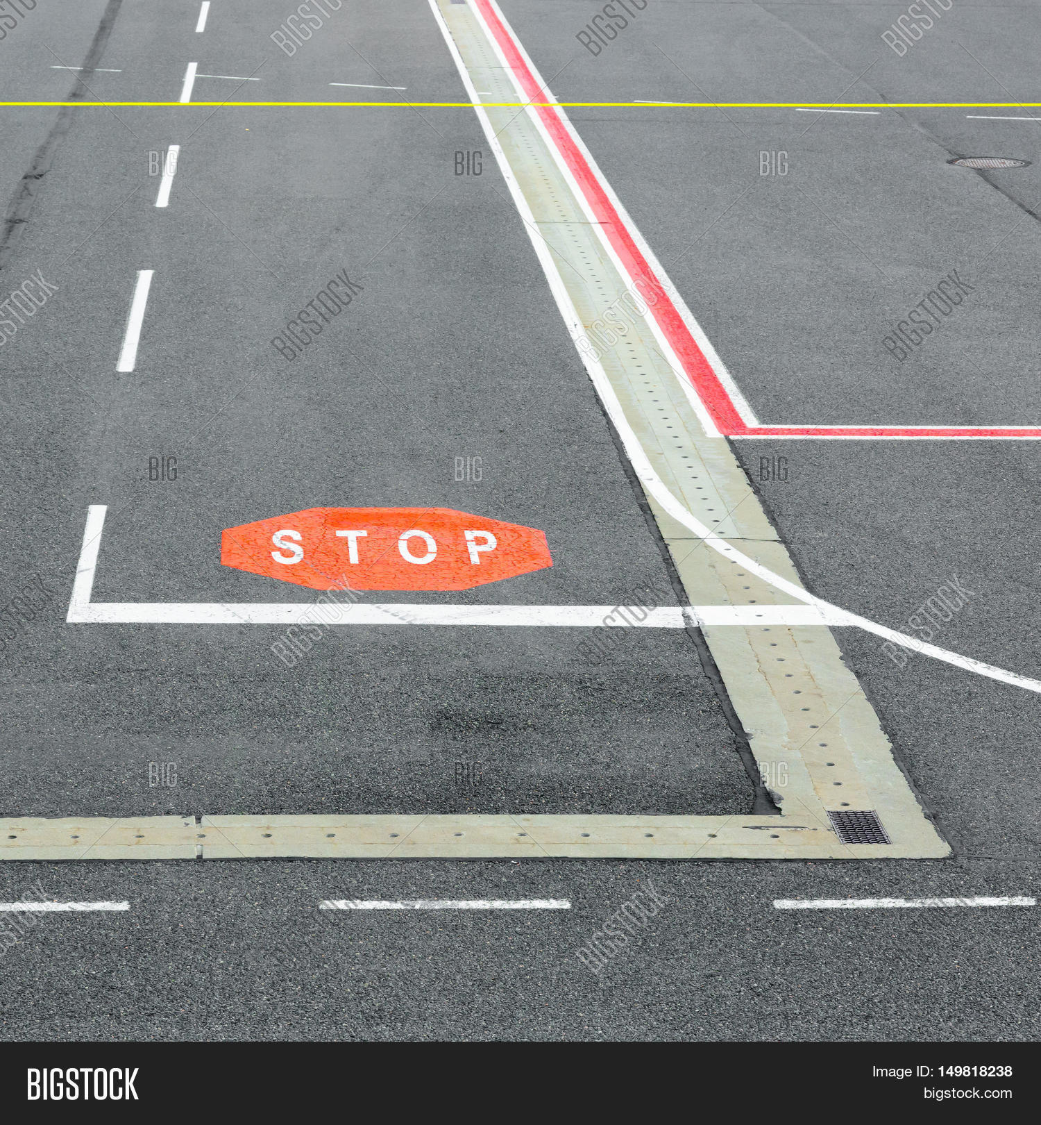 Airport runway and taxiway with marking and signs. Stock Photo & Stock