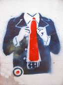 image of wall street  - grafitti sprayed on a street wall  - JPG 