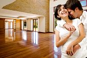 foto of future  - Young happy couple at their new house - JPG 