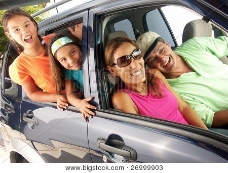 Picture or Photo of Hispanic family in a car.
Family tour in a car.