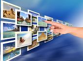 foto of future technology  - Woman hand choosing a holiday  - JPG 