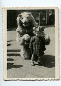picture of  photo  - Vintage photo of little girl with fake bear - JPG 
