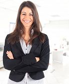 stock photo of woman  - Portrait of a cute young business woman smiling - JPG 