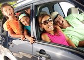 pic of family  - Hispanic family in a car.
Family tour in a car. - JPG 