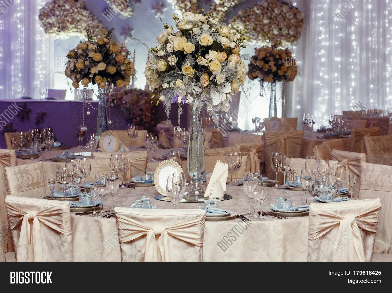 Luxury Wedding Decor With Flowers And Glass Vases Number Of Luxury Wedding Decor With Flowers And Glass Vases Number Of Setting On Round Tables