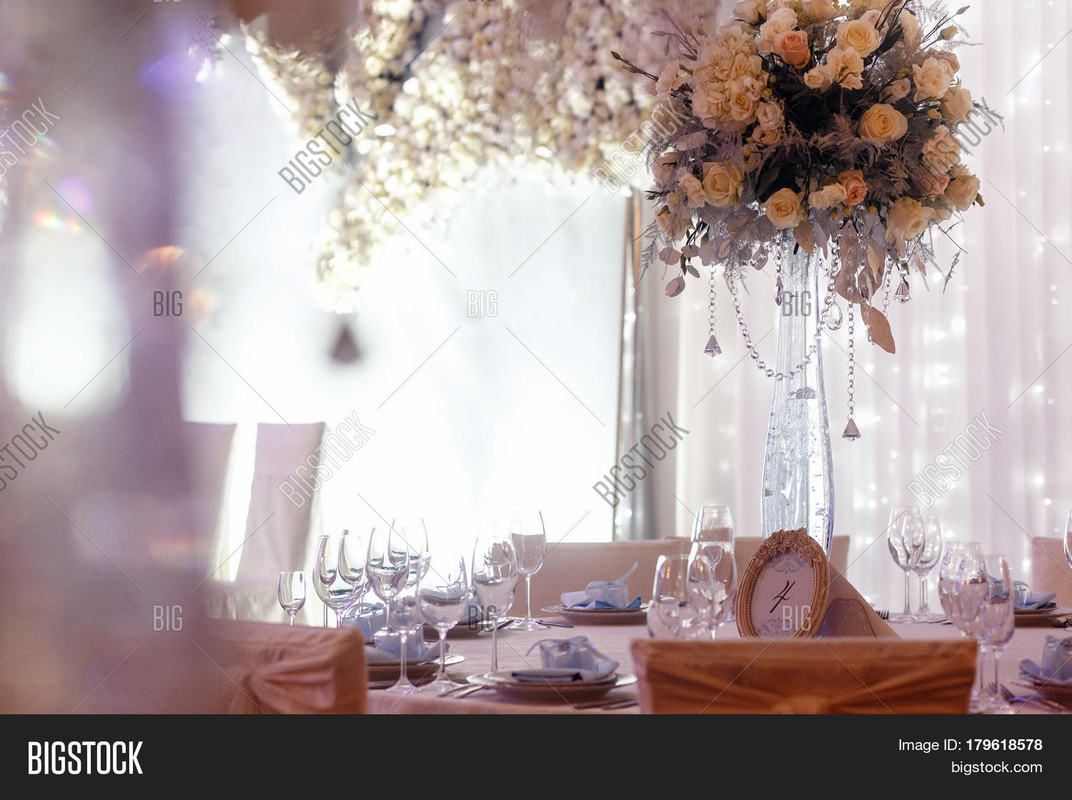 Luxury Wedding Decor With Flowers And Glass Vases Number Of Luxury Wedding Decor With Flowers And Glass Vases Number Of Setting On Round Tables