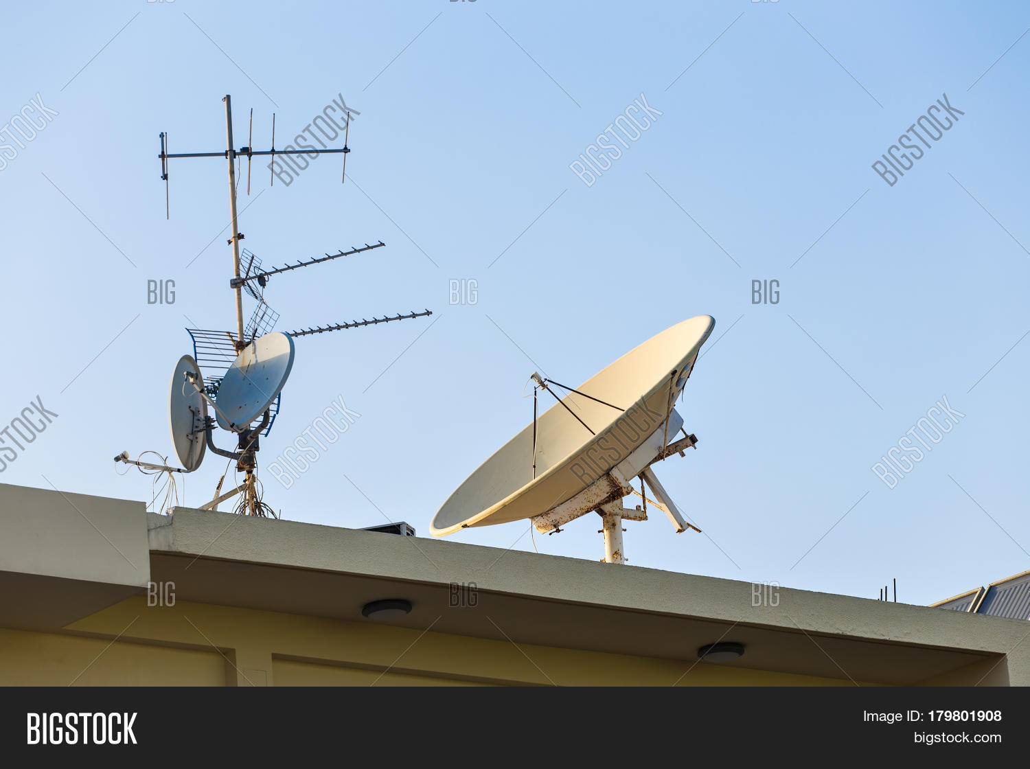 Satellite Dish TV Antennas On House Image & Photo Bigstock