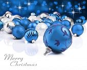 stock photo of objects  - Colorful blue christmas decoration baubles on white with space for text - JPG 