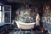 image of interior  - vintage bathtub in grunge interior  - JPG 