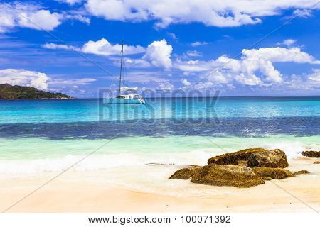 tropical paradise -islands Seychelles, view with sailboat