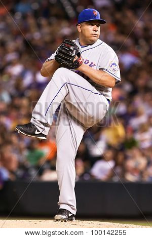 DENVER-AUG 21: New York Mets pitcher Bartolo Colon pitches during a game against the Colorado Rockies at Coors Field on August 21, 2015 in Denver, Colorado.