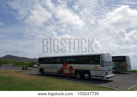 Royalstar Tour Buses Parked At Sandy Beach Park With Dramatic Clouds In The Sky