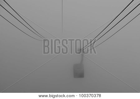 Cable Car Coming Out From The Mist.