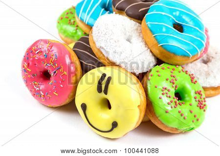 Assorted Glazed Doughnuts In Different Colors