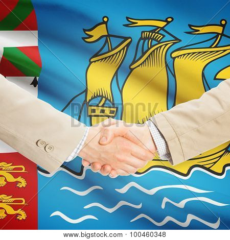 Businessmen Handshake With Flag On Background - Saint-pierre And Miquelon