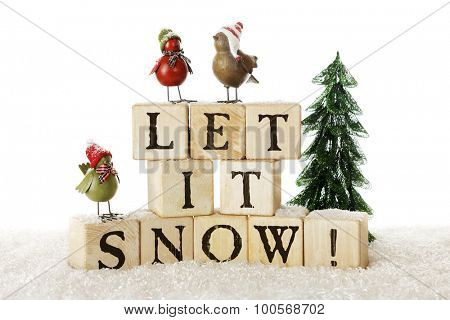 Three whimsical birds in colorful hats standing on rustic alphabet blocks spelling 