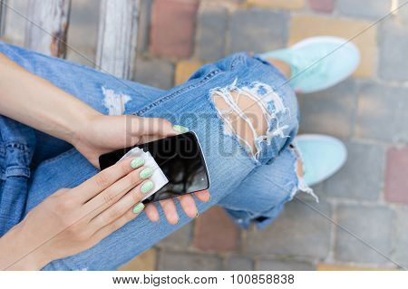 Female Hands Wipe The Touch Screen Phone Antibacterial Wipes