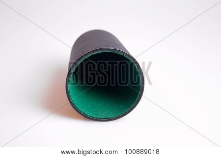 a photo of a dice cup on white background