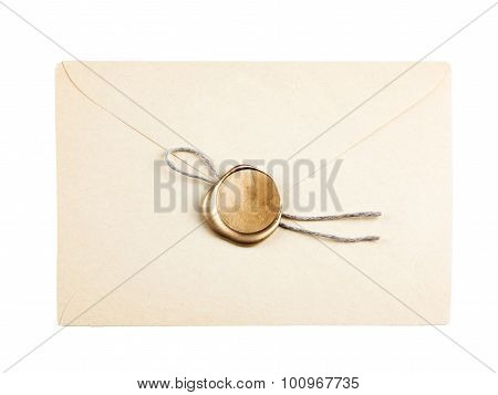 old mail envelope with gold wax seal stamps isolated on white