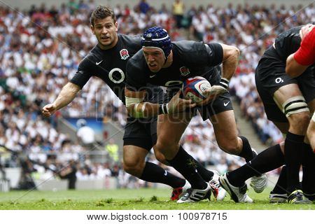 LONDON, ENGLAND. 06 AUGUST 2011. Danny Care playing for England,  and James Haskell playing for England, in action during the rugby union  International between England and Wales at Twickenham Stadium.