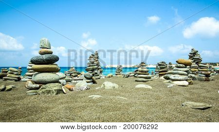 Stones pile on sea beach in cyprus