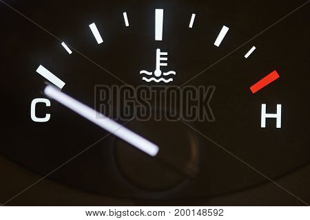 Car temperature coolant meter close-up. Temprature warning control