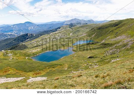 a sunny day in appennini show a beautiful landscapes of glacial lakes