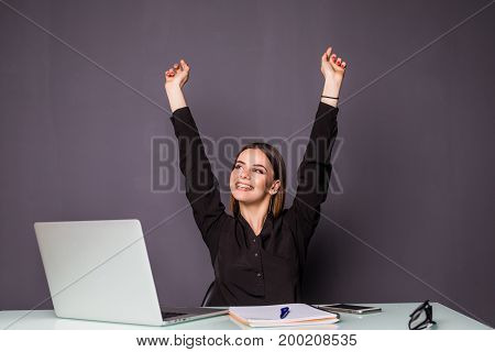 Young Happy Attractive Woman At Modern Office Desk, With Laptop Feeling With Raised Hands Of Celebre