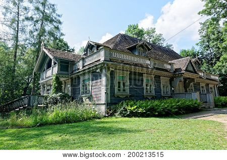 Poland, Bialowieza Palace Park. Old wooden, historic hunters manor house. Oldest building in Bialowieza.