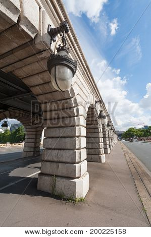Lamppost close-up on Bercy bridge on a sunny day in Paris, France