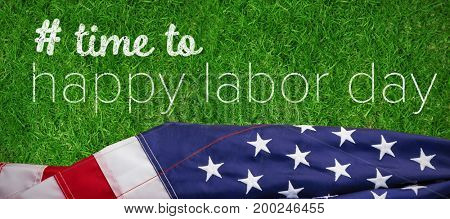 Digital composite image of time to happy labor day text against closed up view of grass